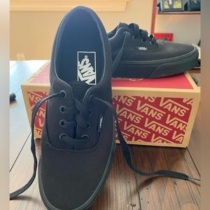 Black Vans, new, never worn. Size 5 In men and 6.5 in women.